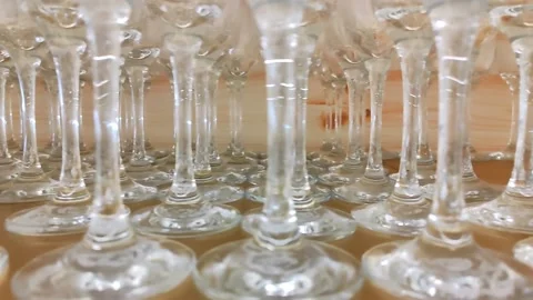 Rows of crystal legs of wine glasses. Stock Footage 220606189