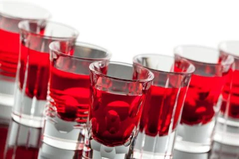 Rows of crystal shot glasses in an angle Stock Photos