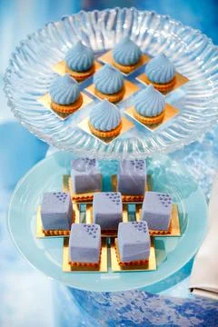 Rows of desserts on the birthday table Stock Photos