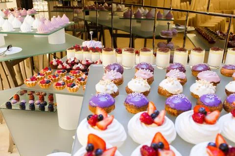 Rows of desserts on the wedding table Stock Photos