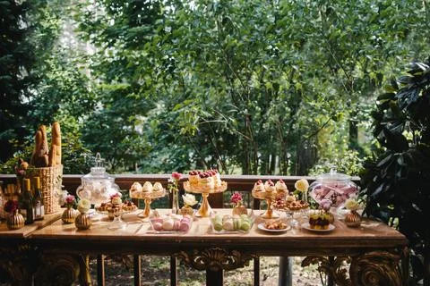 Rows of desserts on the wedding table Stock Photos