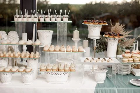 Rows of desserts on the wedding table Stock Photos