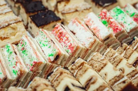 Rows of different dessert cakes on the candy bar Stock Photos