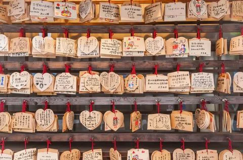 Rows of Ema prayer tablets at a temple in Japan Stock Photos