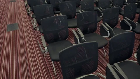 Rows of empty black velvet seats inside a seminar room. Education centre for Stock Footage 105462793