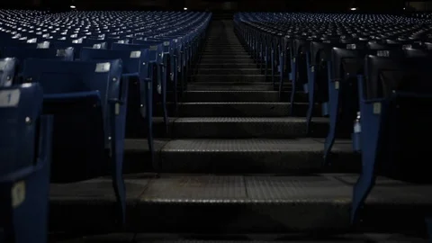 Rows Of Empty Blue Seats At Sporting Stadium Stock-Footage 102054497