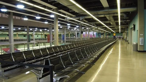 Rows of empty chairs in waiting area at Port Everglades terminal 25 Video stock 117749957