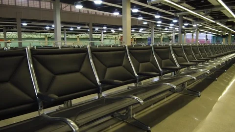 Rows of empty chairs in waiting area at Port Everglades terminal 25 Stock Footage 117750143