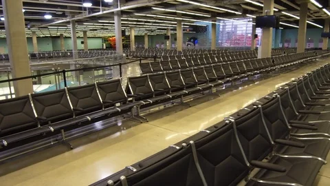 Rows of empty chairs in waiting area at Port Everglades terminal 25 Stock Footage 117750250