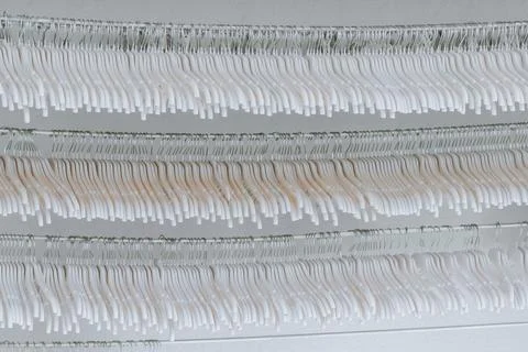 Rows of empty clothes racks in mall. Equipment and stuff of clothes boutique Stock Photos