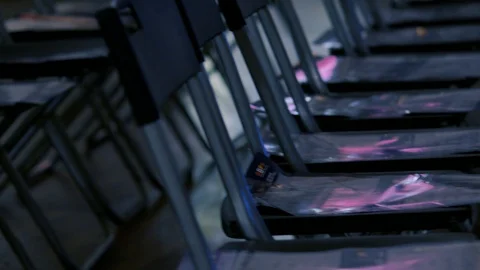 Rows of empty plastic chairs 스톡 동영상 114308097