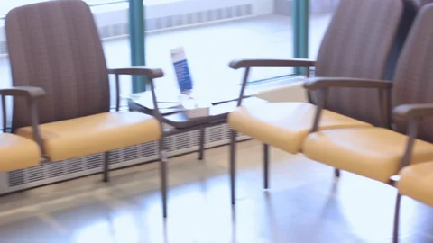 Rows of empty seats in a hospital waiting room Stock Footage 127791280