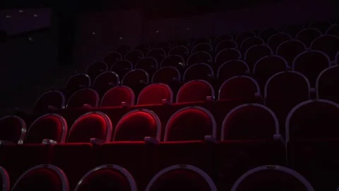 Rows of empty spectator seats in a circus or theater. red upholstered seats for Stock Footage 262042574
