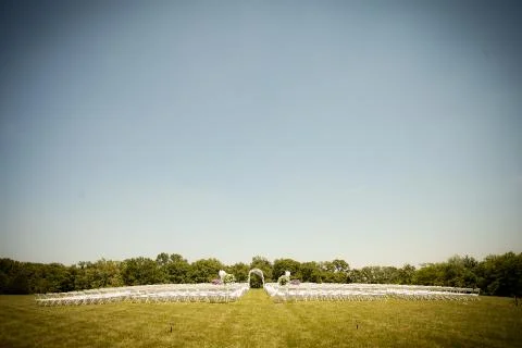 Rows of Empty White chairs Stock Photos