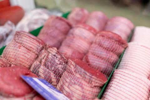 Rows of finest beef brisket joints laid out on a market stall in Yorkshire Stock Photos