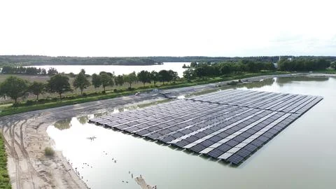 Rows of Floating Solar Cells Photographed by Drone Near Borger Stock Photos