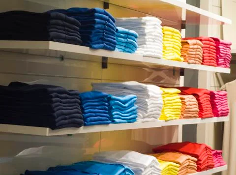 Rows of folded clothes. Foto stock