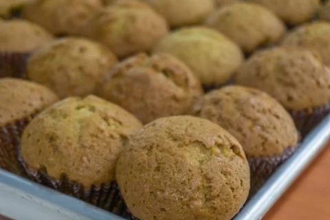 Rows of freshly baked muffins Stock Photos