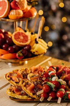 Rows of fruit salad at dinner party catering event Stock Photos