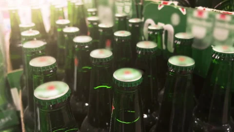 Rows of Glass Beer Bottles in Crate at Store Close Up | Green Glass Bottle Stock Footage 343331722