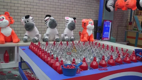 Rows of glass bottles for tossing game Видео 267550896