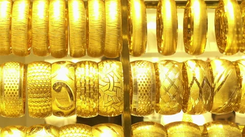 Rows of gold bracelets Stock Footage 86607188