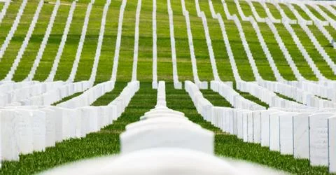 Rows of grave markers on a hillside Stock Photos