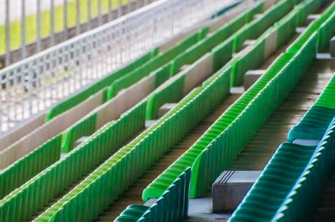 Rows of green seats in stadium Stock Photos