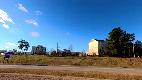 Rows of hotels on a road just off the highway in Augusta Georgia Stock Footage 148060401