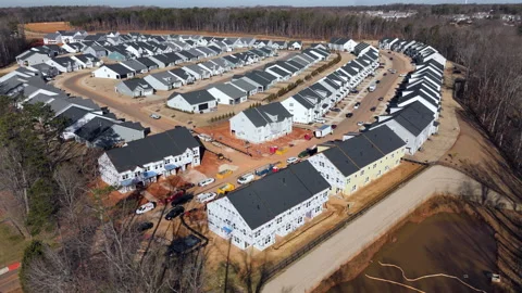 Rows Of Houses In A Residential Subdivision Construction Site. Aerial Drone Shot Stock Footage 333420425