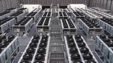 Rows of industrial cooling fan units line data center rooftop in Clifton, New Stock Footage 340042957