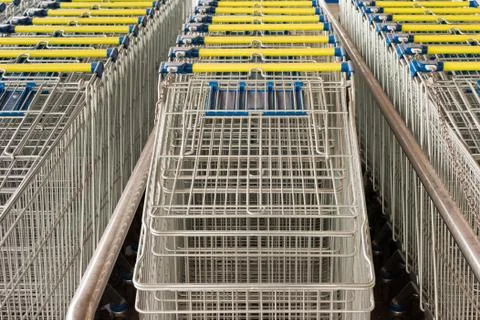 Rows of lined-up shopping carts Stock Photos