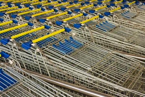 Rows of lined-up shopping carts Stock Photos