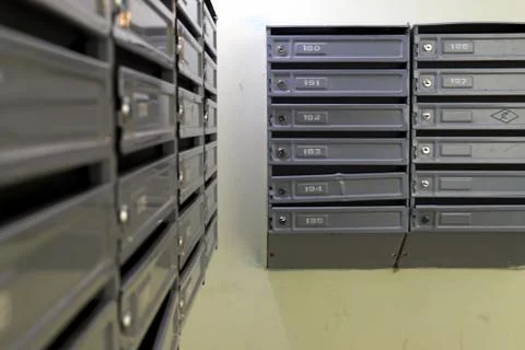 Rows of mailboxes in the condo macro Stock Photos