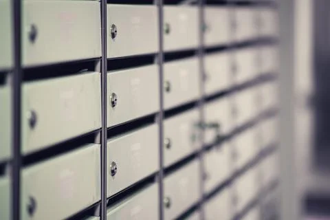 Rows of mailboxes in the lobby of an apartment building, A lot of mailboxes w Stock Photos