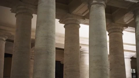 Rows of marble columns fill historic architecture while camera moves slowly Stock Footage 348102843