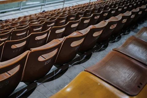 Rows of old seats in the stands Stock Photos