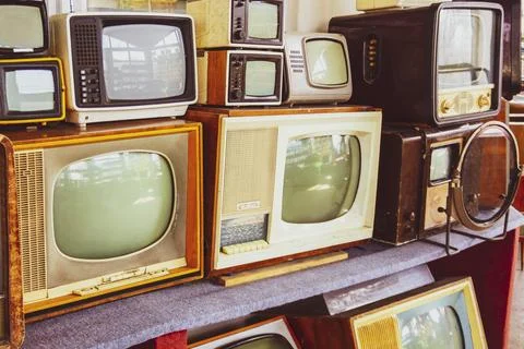 Rows of old TVs.The first televisions are tube-type. Stock Photos