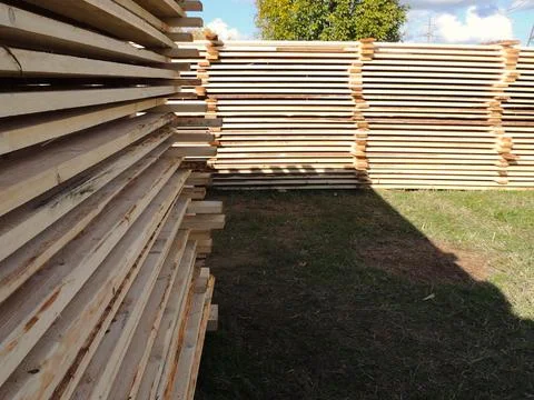 Rows of open air timber warehouse Stock Photos
