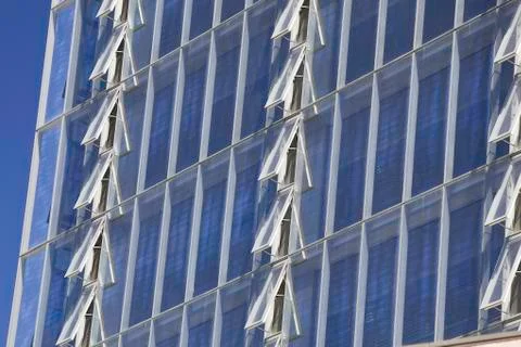 Rows of open windows on the Manitoba Hydro office tower. Considered one of the Stock Photos