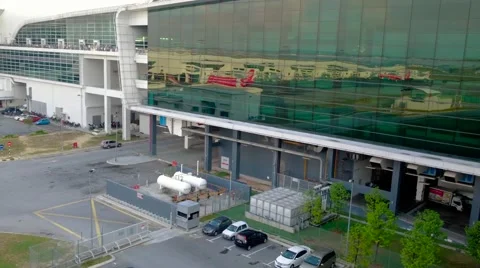Rows Of Planes Reflected In Glass Facade Of Airport Terminal 스톡 동영상 53889057