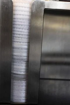 Rows Of Plastic Drink Lids Stacking In A Self Service Stock Photos