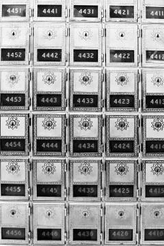 Rows of post office boxes with numbers Stock Photos