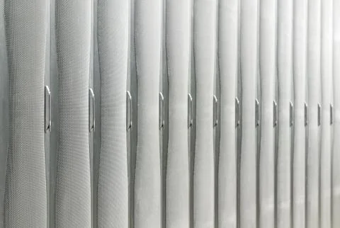 Rows of racks with server and network hardware. Stock Photos