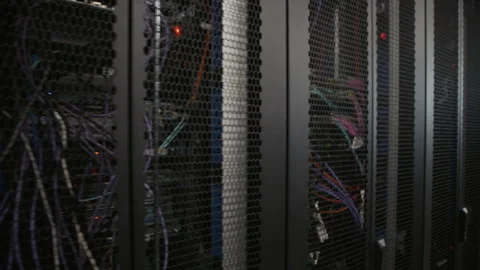 Rows of Server Racks with Network Cables in Data Center Stock Footage 330547560