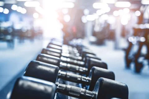 Rows with a set of dumbbells Stock Photos