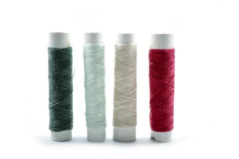 Rows of sewing threads of various colors Stock Photos