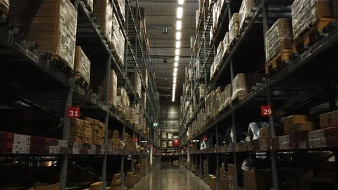 Rows of shelves with goods boxes in factory warehouse Stock Footage 110460502