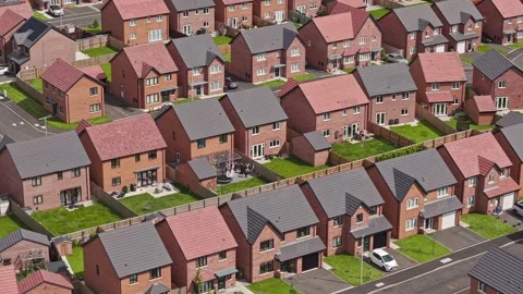 Rows of small new build houses, Wirral, England Stock Footage 336481466