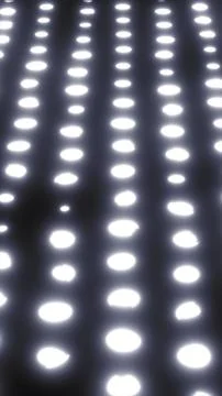 Rows of soft glowing dots forming a bright futuristic surface with subtle dep Illustrazione stock
